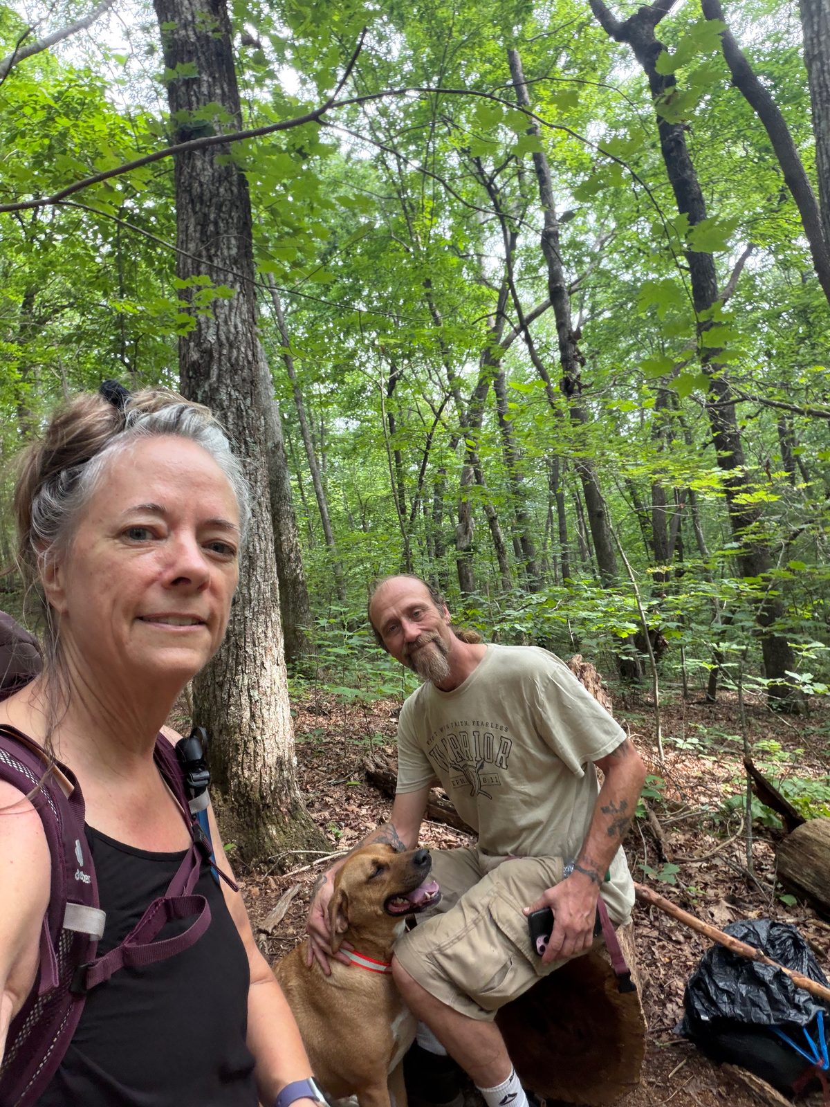 Me, Lynx, and Sunshine the trail dog in the woods